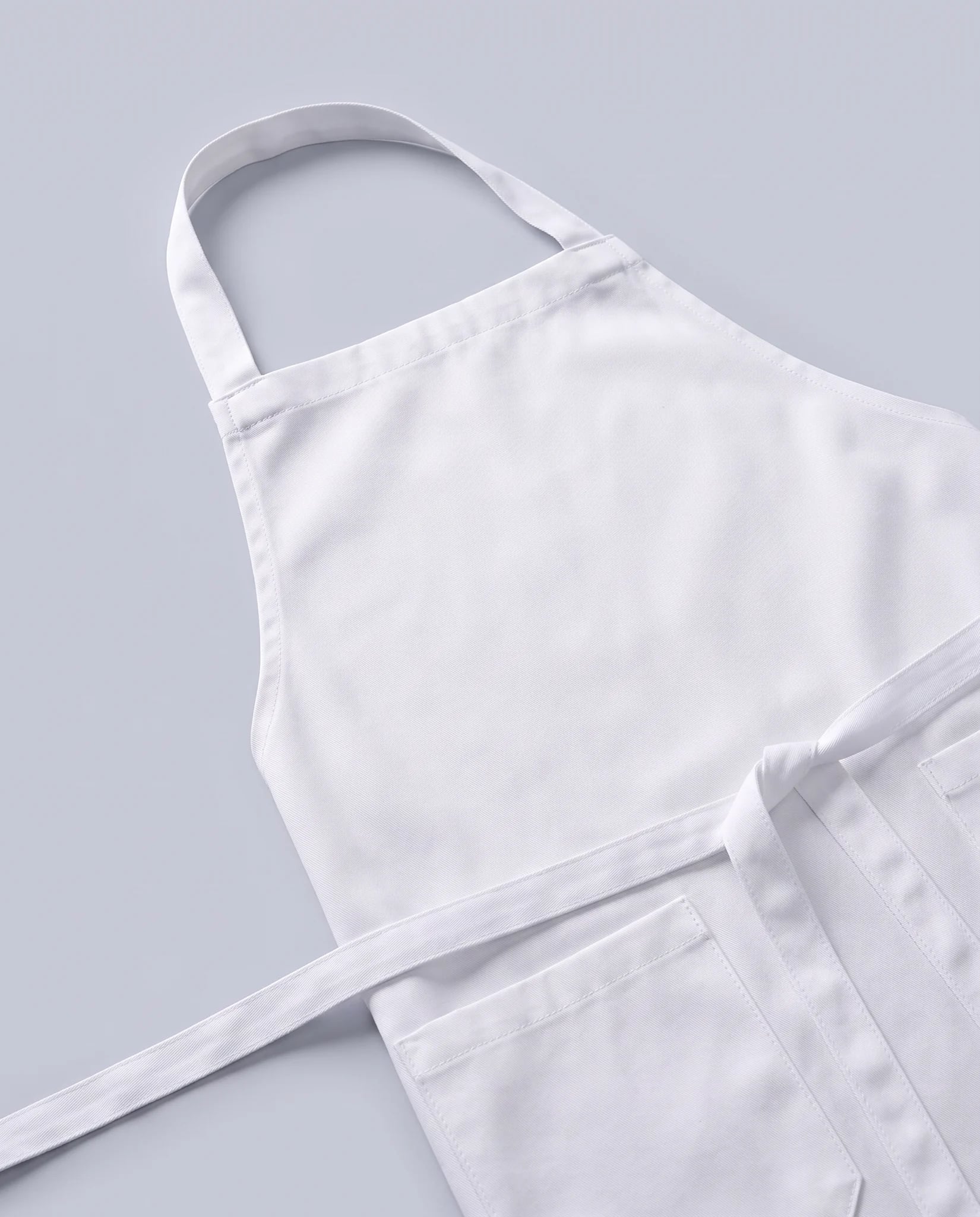 Chefschürze mit Latz – Gewebe im Detail